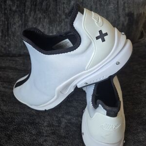 Nike White Slip-On Sneakers